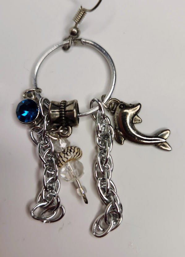 Handcrafted Charm Earrings In Silver Color With Shells, Dolphin and Blue Crystal Charms