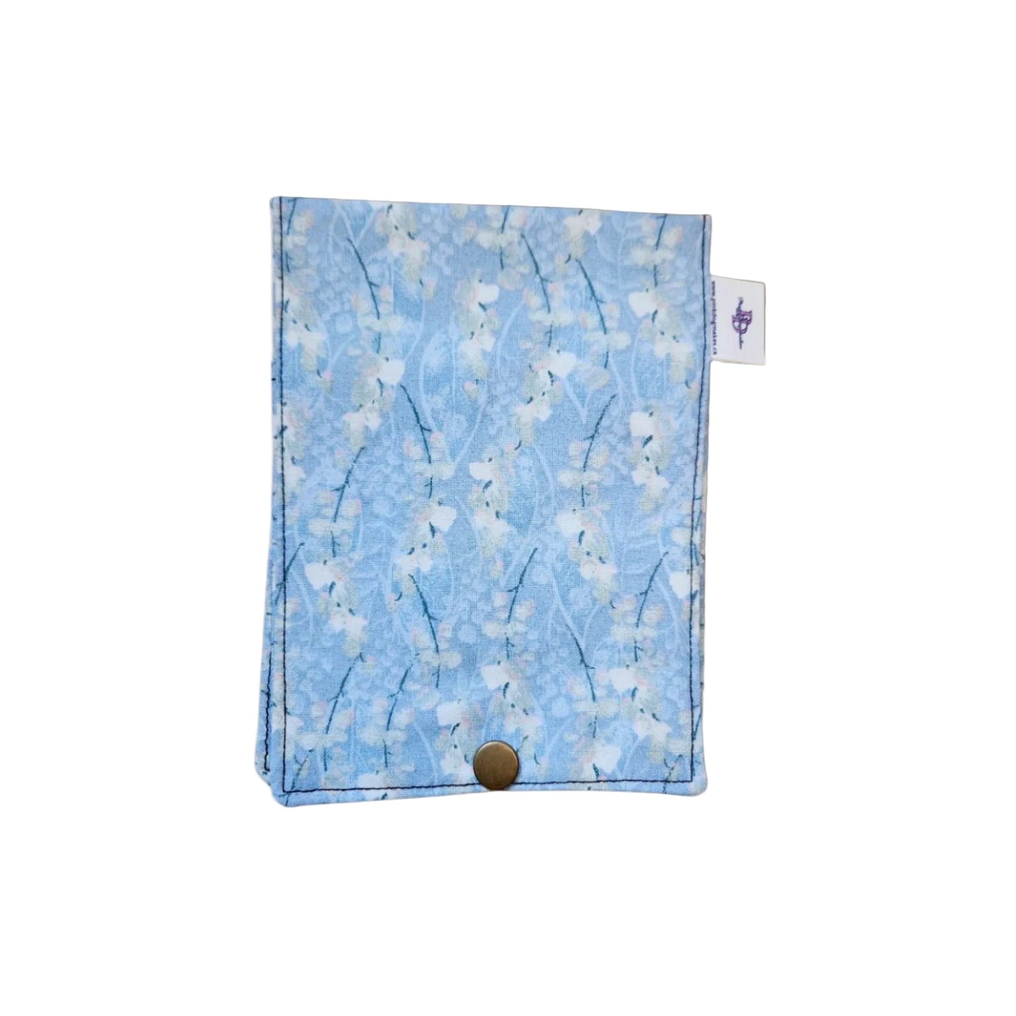 Floral patterned pouch with a button on a white background