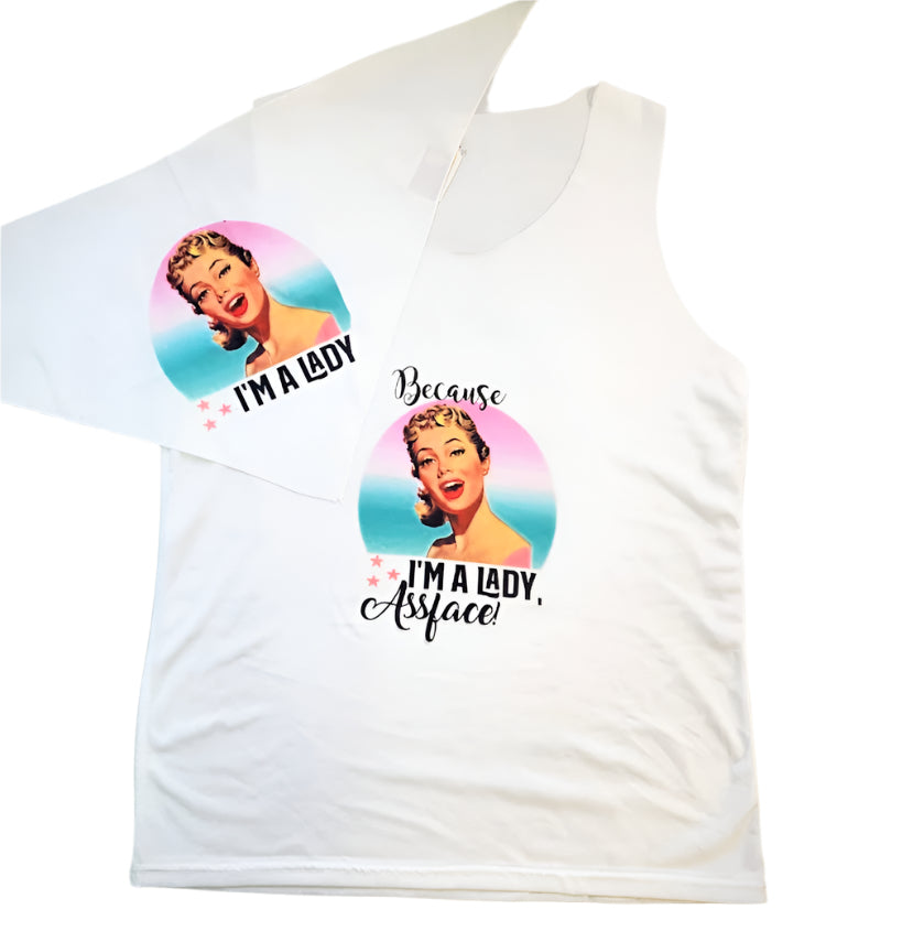A white tank top and matching pet bandana with retro design graphics and text laid out on a flat surface.