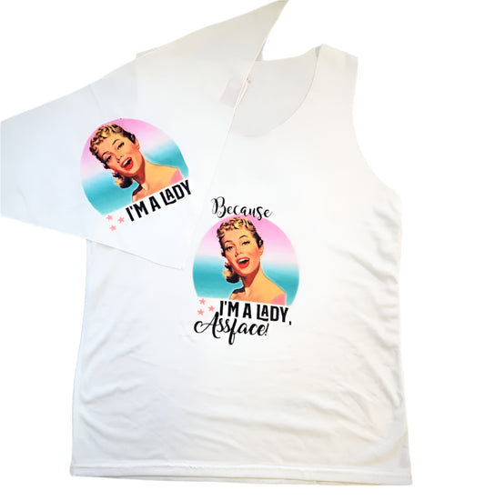 A white tank top and matching pet bandana with retro design graphics and text laid out on a flat surface.