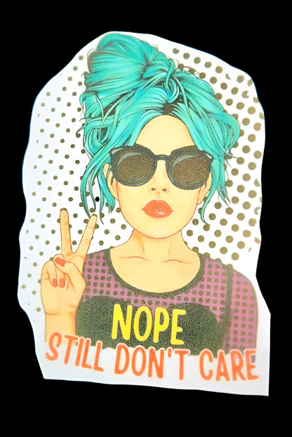 Sticker with a person with blue hair and sunglasses, making a peace sign, with 'NOPE STILL DON'T CARE' text on a polka dot background.