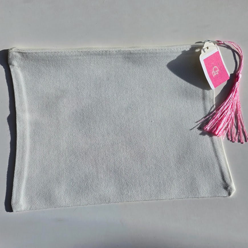 A light gray fabric pouch with a zipper closure and a pink tassel tag, photographed on a plain light background.