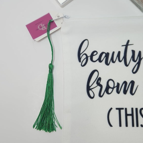 Canvas makeup bag with green tassel and printed design