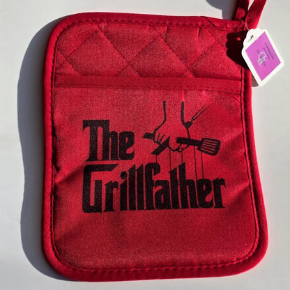 Red quilted BBQ potholder with black grilling design and hand pocket